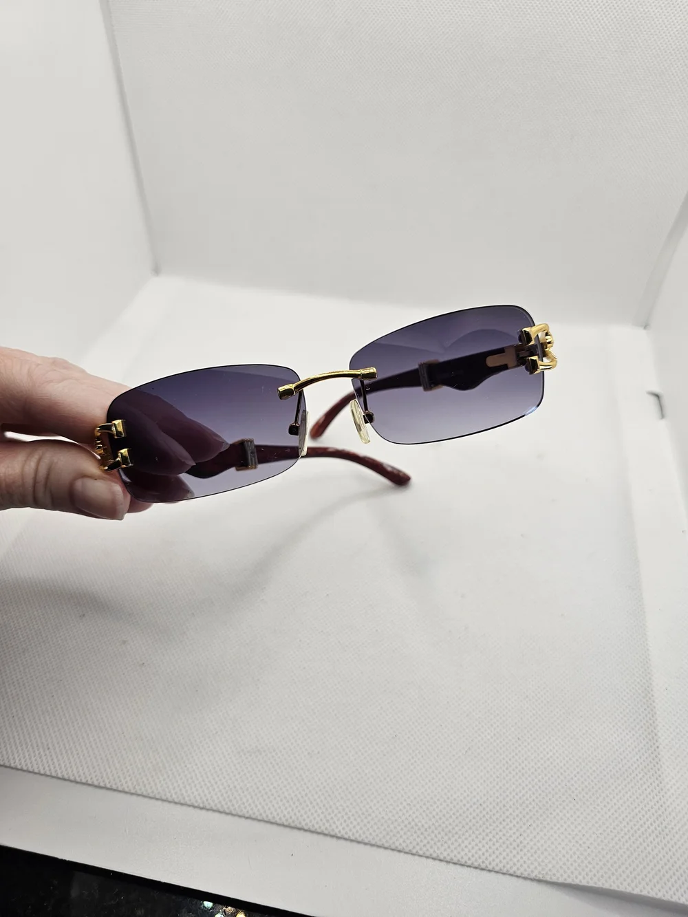Rimless Women's Sunglasses with Gold Panther Accents and Purple Gradient Lenses